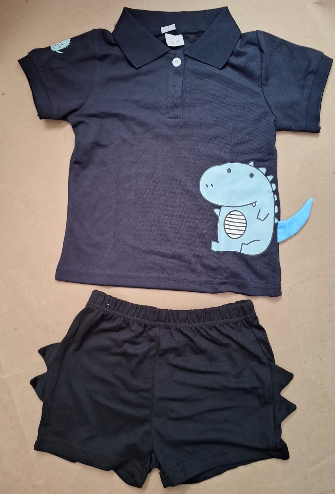 Conjunto tipo polo dinosaurio